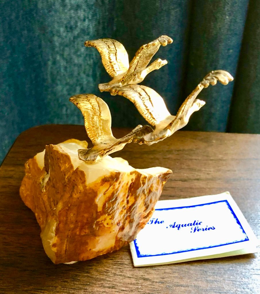 24K Gold plated pewter sculpture on Ocher Onyx. Aquatic Series 1974. Original Price $30. Present value (2023) VF $300.; G $150.; R $70