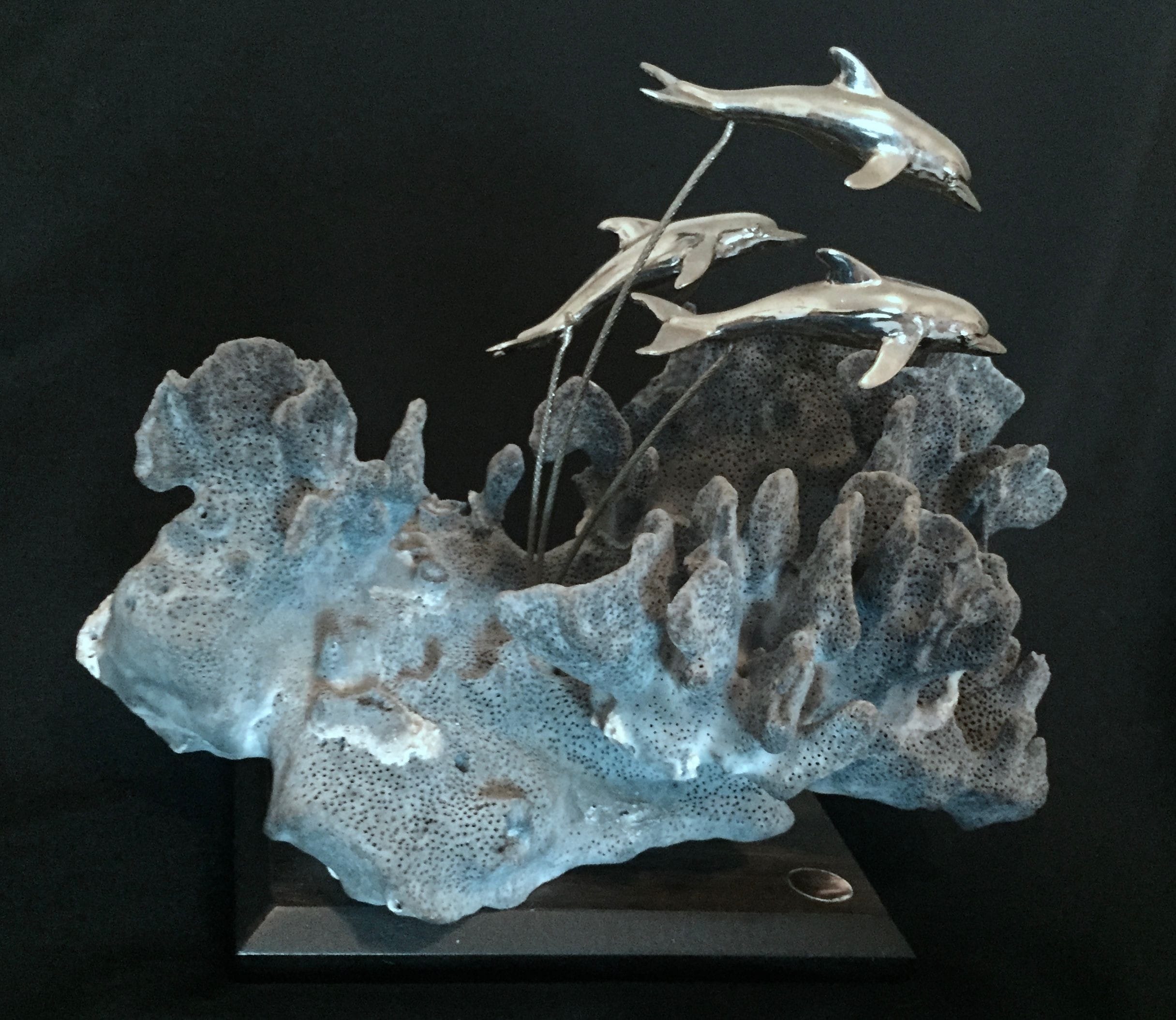 1970s nickle plated dolphins sculpture from the "Aquatic Series" by Jess Nelson mounted with Blue Coral. Special commission