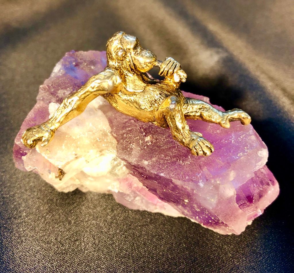 24K Gold plated pewter sculpture on Purple Flourite mineral. Whymsical Series 1974. Original Price $20. Present value (2023) VF $200.; G $100.; R $50