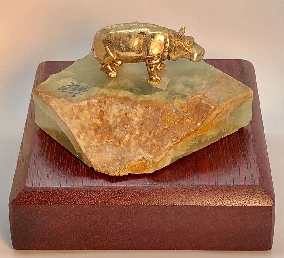 24K Gold plated pewter sculpture on Green Onyx. Wild Kingdom Series 1974. Original Price $20. Present value (2023) VF $200.; G $100.; R $50